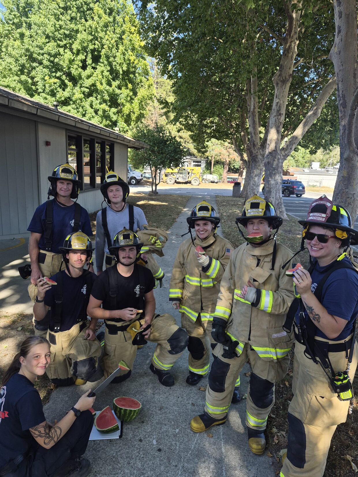 Sydney cutting up watermelon for the Felton Fire crew after training